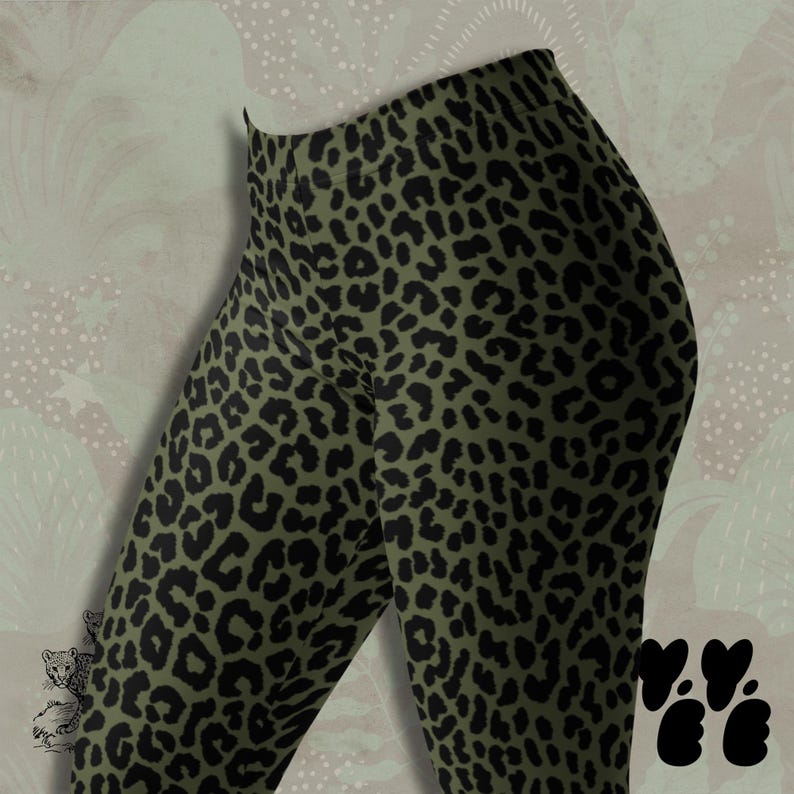 May include: Leggings featuring an olive green base color with a repeating black leopard print pattern. The garment has a high-waisted design and a fitted silhouette that covers the legs from the waist down to the ankle area.