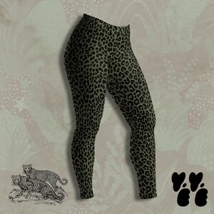 May include: Full-length leggings featuring an olive green base color with a repeating black leopard print pattern. The garment has a high-waisted design and a fitted silhouette that extends from the waist down to the ankle on both legs.