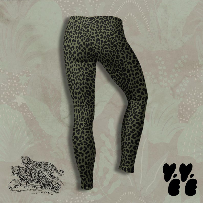 May include: Full-length leggings featuring a dark olive green base color with a repeating black leopard print pattern. The garment has a fitted silhouette with a high waistband and tapered legs that extend down to the ankles.