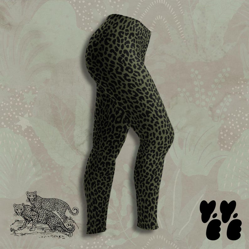 May include: Leggings featuring an olive green base color with a repeating black leopard print pattern. The garment has a high-waisted design and full-length legs that taper toward the ankles, showcasing a consistent animal-inspired graphic.