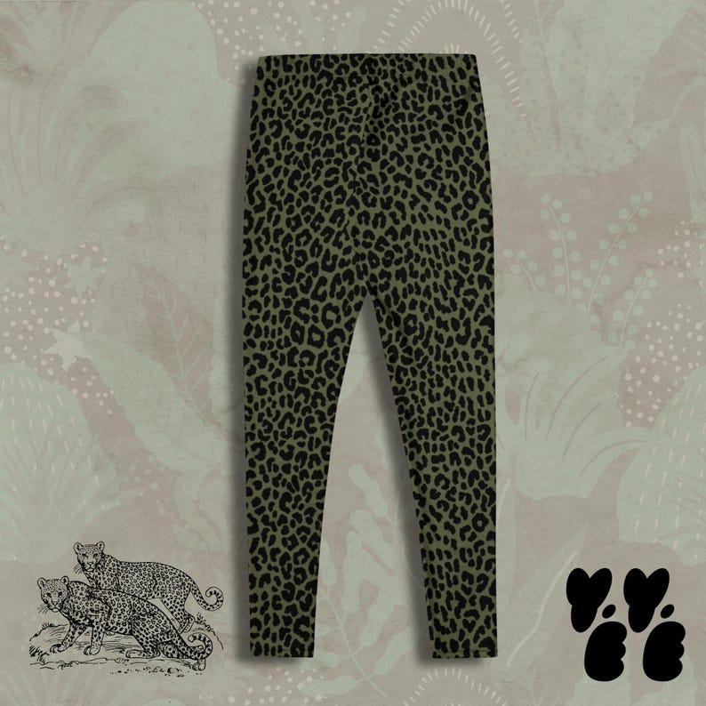 May include: Full-length leggings featuring an olive green base color with a repeating black leopard print pattern. The garment has a fitted silhouette with a high waistband and tapered legs, showcasing a consistent animal-inspired design.