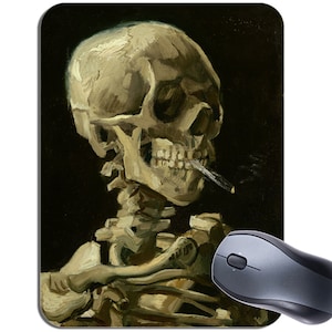 May include: A painting depicting a human skull with a cigarette in its mouth. The skull is painted realistically, showing bone structure and teeth. The background is dark, highlighting the skull as the central subject.