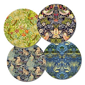 May include: Four circular coasters with detailed floral and animal designs. One coaster displays green and yellow flowers, another has birds and berries, a third features foxes and peacocks, and the last shows a blue and yellow pattern.
