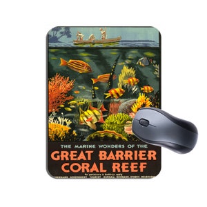 May include: A vintage travel poster advertising the Great Barrier Reef in Australia. The poster features a colourful illustration of coral reefs and tropical fish underwater, with a boat and people above the waterline. The text reads "The Marine Wonders of the Great Barrier Coral Reef".
