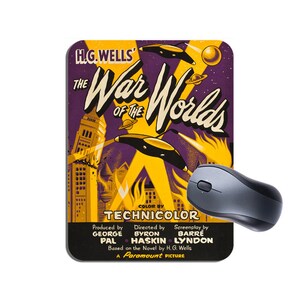 May include: A yellow and purple mouse mat with a vintage movie poster design for the film "The War of the Worlds" by H.G. Wells. The poster features a flying saucer, a burning city, and the text "Color by Technicolor".