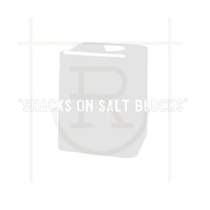 May include: A white salt block with the letter "R" printed on it. The text "*SNACKS ON SALT BLOCKS*" is printed below the letter.