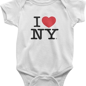 May include: White baby onesie with a black graphic that says "I love NY" with a red heart.