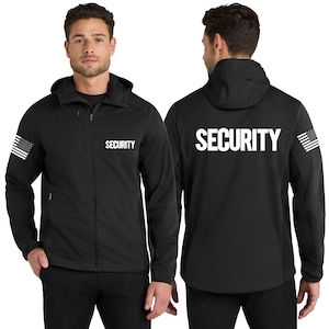 May include: Black security jacket with a hood and a full-length zipper. The word "SECURITY" is printed in white on the front and back. An American flag patch is on the left sleeve. The jacket is worn by a person.
