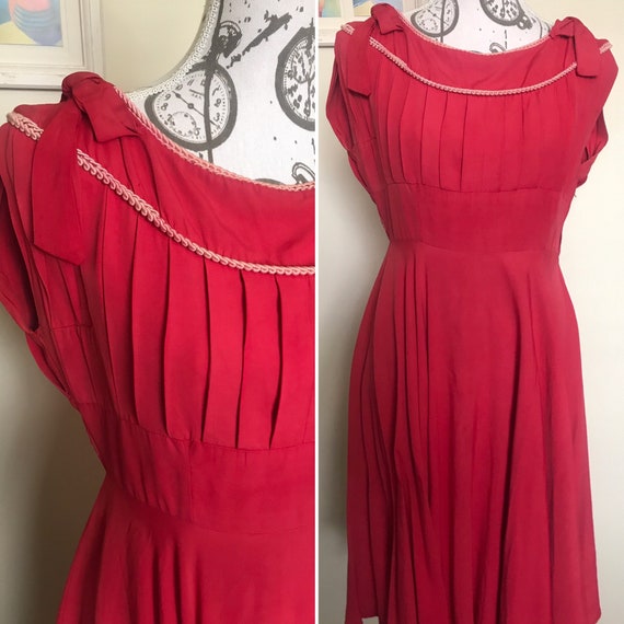 Vintage 1950s stunning pink swing day dress