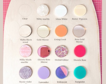 May include: Acrylic color swatches in various colors and finishes, including clear, milky marble, gloss white, butter popcorn, Baltic birch wood, gold mirror, living coral, rose gold mirror, milky blush marble, electric rose mirror, orchid glitter, electric rose, mystic violet marble, lavender, iridescent, turquoise, lime glitter, silver mirror, and gloss black.