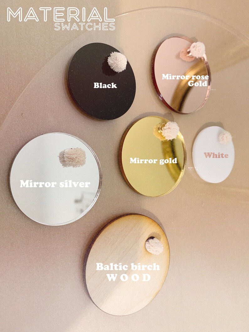 May include: Material swatches for crafting projects.  The swatches include black, mirror silver, mirror gold, mirror rose gold, white, and Baltic birch wood.