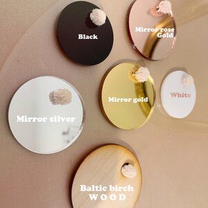 May include: Material swatches in black, mirror rose gold, mirror gold, mirror silver, white, and Baltic birch wood.