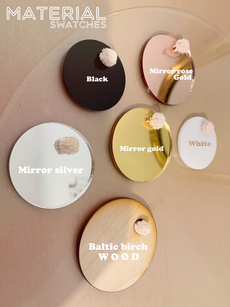 May include: Material swatches in black, mirror rose gold, mirror gold, mirror silver, white, and Baltic birch wood.