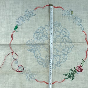 Vintage stamped linen table mat for embroidery, both freestyle and cutwork techniques. Partly started.