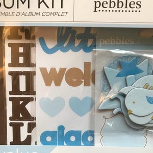 Scrapbook kits. ‘New Baby’ blue themed scrapbook or a BStorify scrapbook with lots of stickers and stencils. Both new!