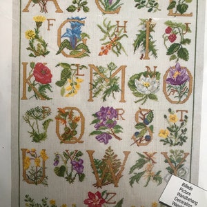 Vintage cross stitch kit, ‘The flower sampler’.  A kit by Permin 50 x 70 cms. Preowned, unused, in perfect condition. Stunning design!