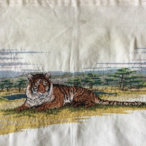 Cross stitch picture, tiger in the grass. Could be framed as it is or finished with the threads and chart provided.