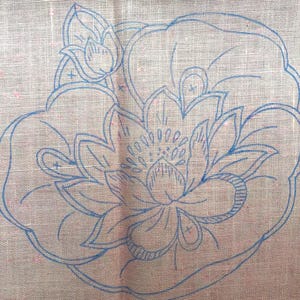 Vintage, stamped pink linen mats for cutwork embroidery. Floral design. One large and two small mats. Excellent condition