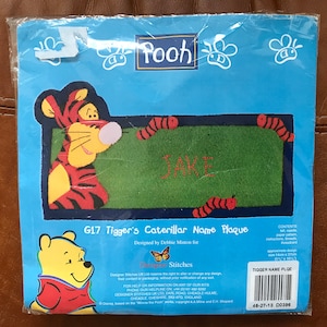 Winnie the Pooh sewing kit. Tiggers, felt appliqué name plaque kit. New and unopened. Measurements 5.5” x 10.5”