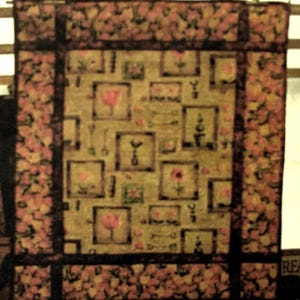 Quilt kit ideal for a beginner. Antique garden uses 4 different fabrics with a large garden panel in the centre.