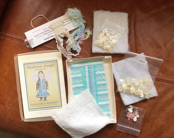 Vintage sewing kit. Bedtime angel is made using buttons, material and various other items. Rare. Unusual. Everything is in the kit.