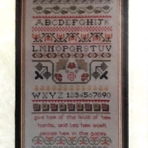 Vintage Band Sampler kit from 1993. A lovely 17th century stitch sampler designed to display lots of traditional patterns and stitches.