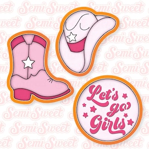 May include: Three pink cookie cutters, one shaped like a cowboy hat, one shaped like a boot, and one round with the text "Let's go girls" and stars.