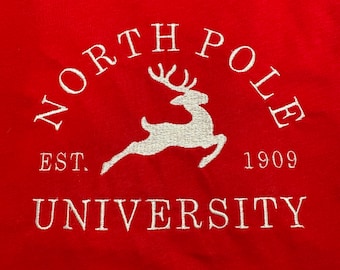 T-shirt natalizia ricamata della North Pole University
