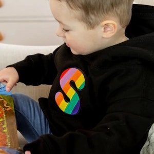 Kid&#39;s Personalised Rainbow Embroidered Initial Black Hoodie