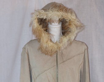 May include: A beige suede jacket with a faux fur hood and trim. The jacket has a zipper closure and decorative stitching.