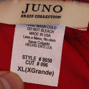 May include: White tag with black text that reads "JUNO DRESS COLLECTION" and care instructions in English and Spanish. The tag also includes style and cut numbers, and the size XL(XGrande).