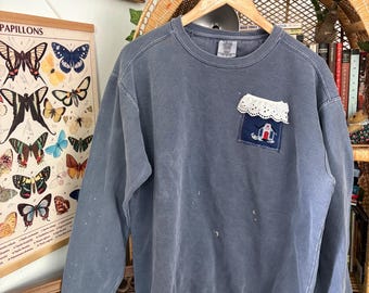 Sudadera con parche vintage