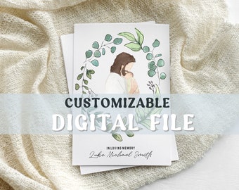 May include: A digital file of a watercolor illustration of a person holding a baby. The illustration is surrounded by a wreath of green leaves. The text "In Loving Memory Luke Michael Smith" is at the bottom of the image.