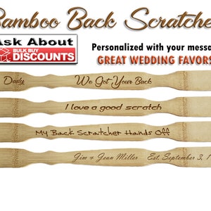 May include: Five wooden back scratchers with different engraved messages. The messages include "Daddy", "We Got Your Back", "I love a good scratch", "My Back Scratcher Hands Off", and "Jim & Jean Miller Est. September 3, 1964".