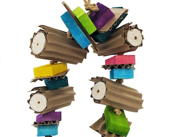 May include: A hanging bird toy featuring a series of colorful wooden blocks in shades of blue, green, yellow, pink, and purple, interspersed with segments of brown corrugated cardboard and light-colored wooden dowels, all strung on a tan rope.