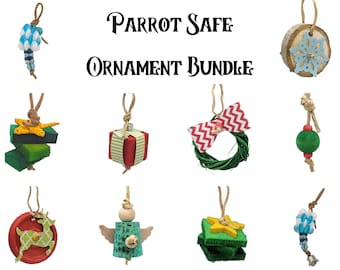 May include: A Parrot Safe Ornament Bundle featuring various hanging decorations including a wood slice with a blue snowflake, a red gift box, a green wreath with a chevron bow, a reindeer disc, and wooden blocks with stars.