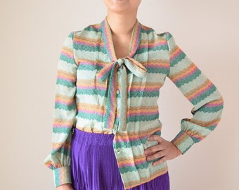 Psychedelic geometric bow blouse