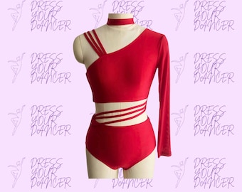May include: A bright red two-piece dance outfit featuring a long-sleeved crop top with a mock neck, three diagonal shoulder straps, and a cutout midriff section with three horizontal straps connecting to high-waisted briefs.