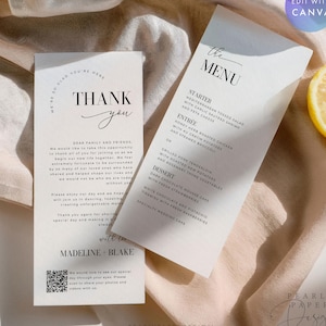 Op de afbeelding: Een elegante trouwbriefpapierset met een bedankkaart en een menukaart. De kaarten zijn wit met zwarte tekst. Het menu bevat voorgerecht, hoofdgerecht en dessert. De namen Madeline en Blake staan erop.