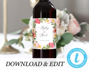 Könnte beinhalten: Ein druckbares Weinetikett mit einem Aquarell-Blumenkranz-Design. Das Etikett zeigt die Namen "Hyly" und "Brad" mit einem Herzsymbol und dem Datum "09.08.2018".
