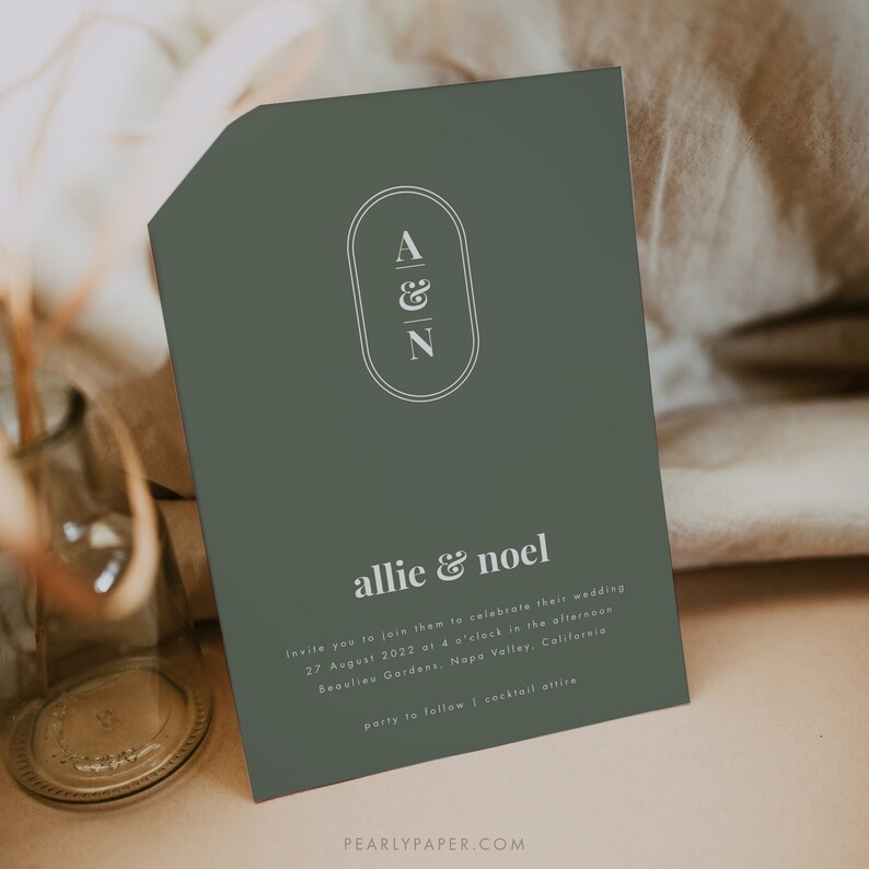May include: A green wedding invitation with white text. The invitation reads "allie & noel" and includes the date, time, and location of the wedding. The invitation also includes the text "party to follow | cocktail attire".