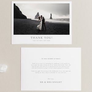 May include: Wedding thank you cards with a black and white photo of a couple on a beach. The top card reads "THANK YOU! FOR THE BEST DAY EVER." The bottom card has a message to friends and family, signed "MR & MRS KNIGHT."