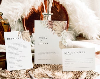 Puede incluir: Conjunto de invitaciones de boda con fondo beige y diseño floral. La invitación dice "Avery y Julian" e incluye detalles sobre la ceremonia y la recepción de la boda. La tarjeta RSVP dice "Kindly Reply".