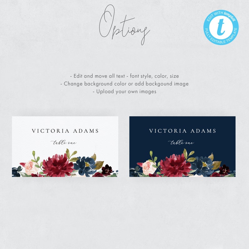 May include: Two editable table cards with a floral design. The cards are white and navy blue with burgundy and blue flowers. The text on the cards reads "VICTORIA ADAMS table one".