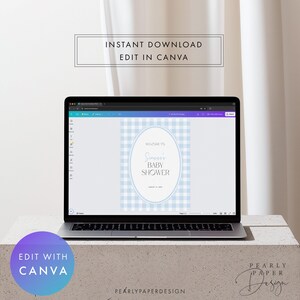 May include: A laptop displays a baby shower invitation design. The invitation features a blue and white gingham pattern with an oval frame. Text includes "Welcome to [Name]'s Baby Shower" and "Edit with Canva."