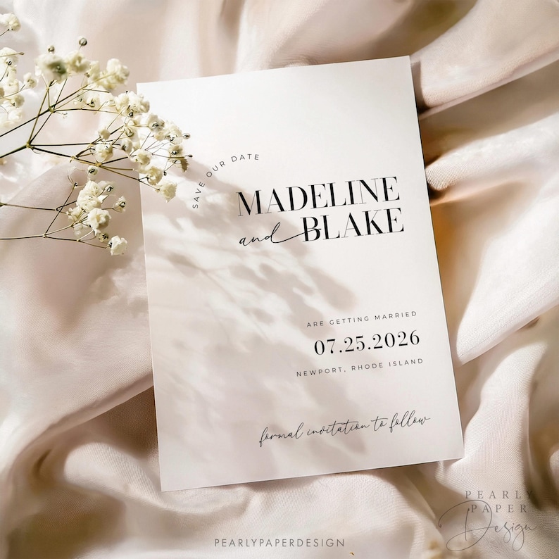May include: Save the date card with a white background and black text. The card says "Save Our Date" in a circle, "Madeline and Blake" in a modern font, "Are Getting Married" in a smaller font, "07.25.2026" in a larger font, "Newport, Rhode Island" in a smaller font, and "Formal Invitation to Follow" in cursive.