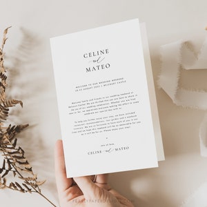 May include: A white wedding weekend welcome card with black text. The card features the names "CELINE and MATEO" and the date "20-22 AUGUST 2022". The card also includes the location "BELCOURT CASTLE".