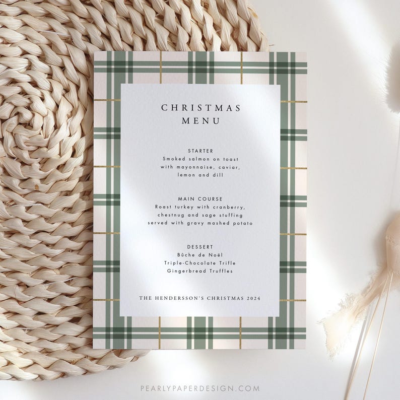 May include: A Christmas menu card with a green and white plaid pattern. The menu includes starter, main course, and dessert options. The text reads "Christmas Menu", "Starter", "Smoked salmon on toast with mayonnaise, caviar, lemon and dill", "Main Course", "Roast turkey with cranberry, chestnut and sage stuffing, served with gravy mashed potato", "Dessert", "B&uuml;che de No&euml;l", "Triple-Chocolate Trifle", "Gingerbread Truffles", and "The Henderson's Christmas 2024".