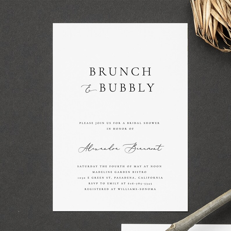 May include: A white card with black text announcing a bridal shower for Alexandre Beaumont. The event is called "Brunch & Bubbly" and will be held at Madeline Garden Bistro on Saturday, May 4th at noon. The address is 1030 E Green St., Pasadena, California. RSVP to Emily at 626-785-5345. The event is registered at Williams-Sonoma.