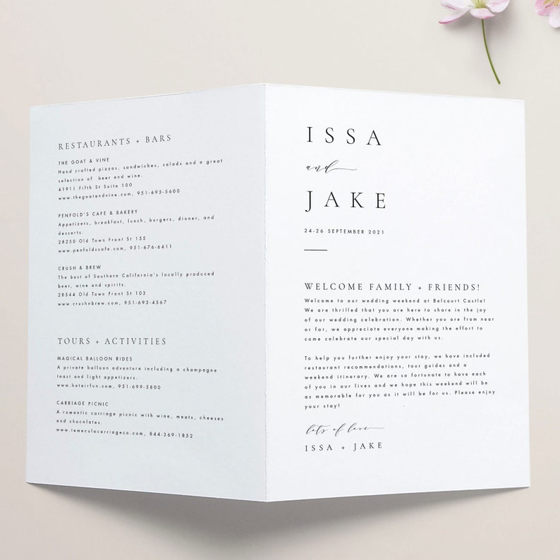 May include: A white wedding invitation with a simple design. The invitation features the names "ISSA and JAKE" in a modern font, along with the wedding date, "24-26 SEPTEMBER 2021". The invitation also includes a welcome message for guests, inviting them to celebrate the couple's wedding weekend at Belcourt Castiel.